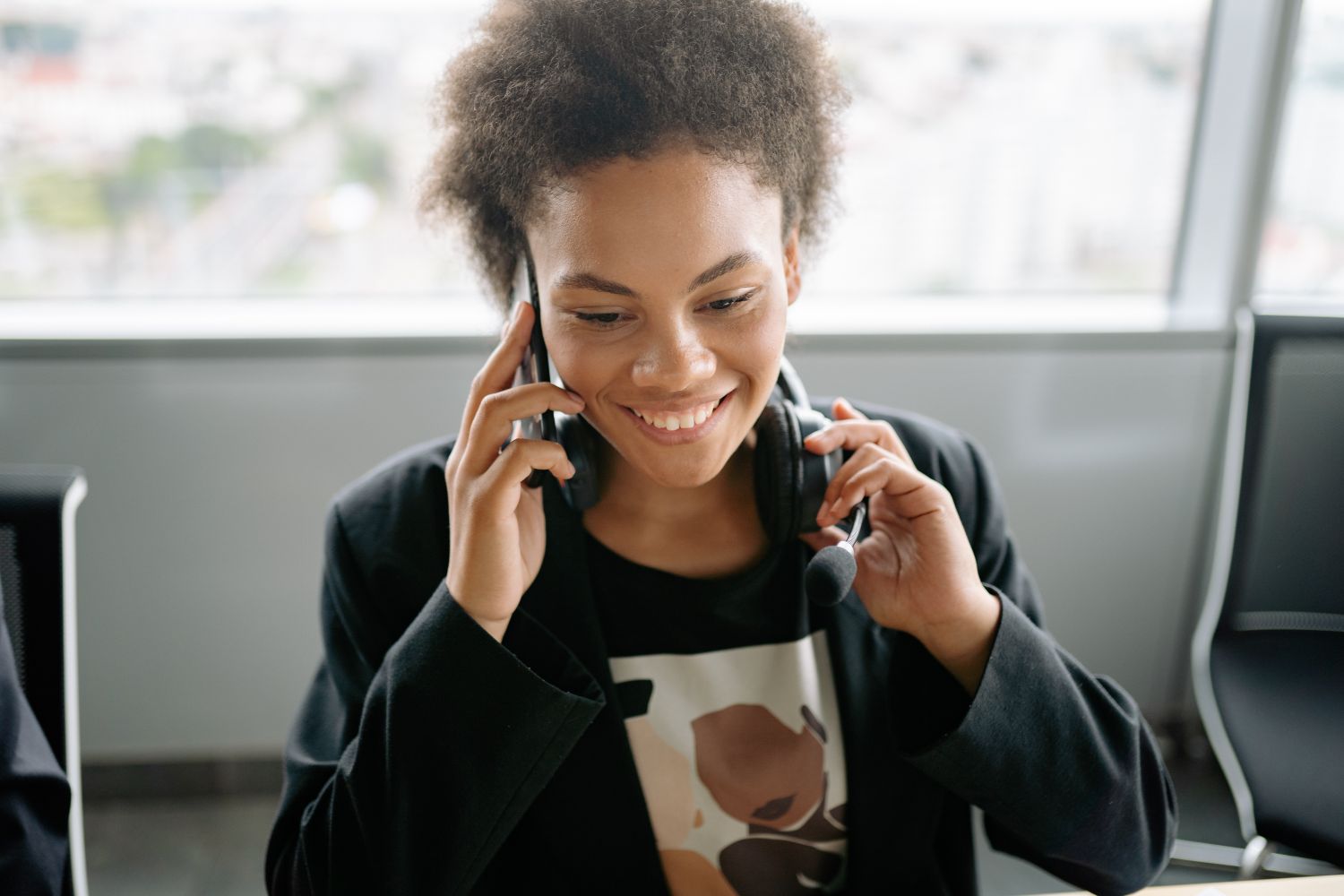 A volunteer making calls on a headset